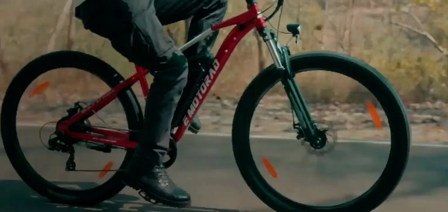 A rider on an EMotorad electric cycle